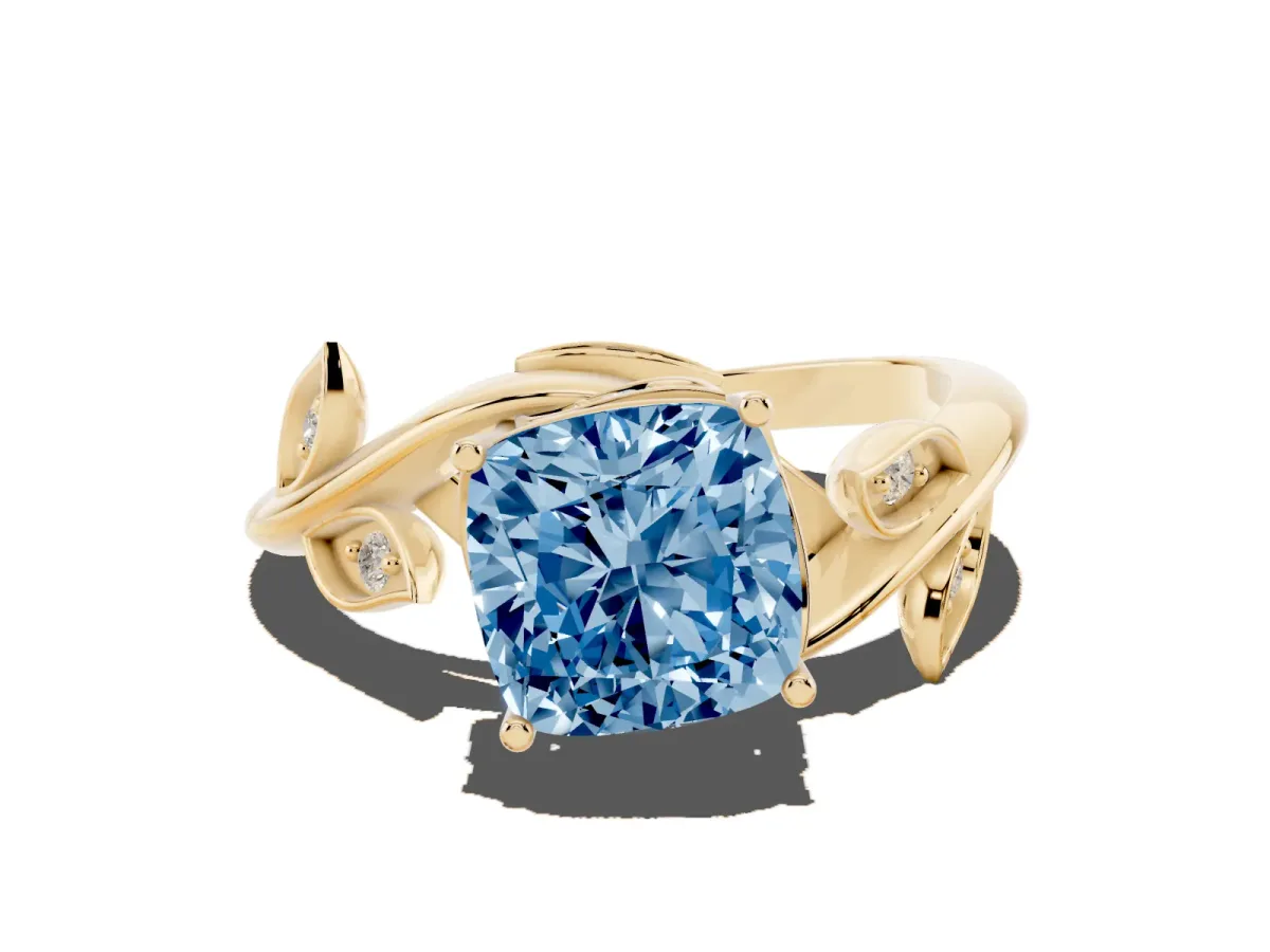 Fancy Blue Cushion Cut Solitaire Twist Engagement Ring with Leaf Accents and Prong Setting Yellow gold