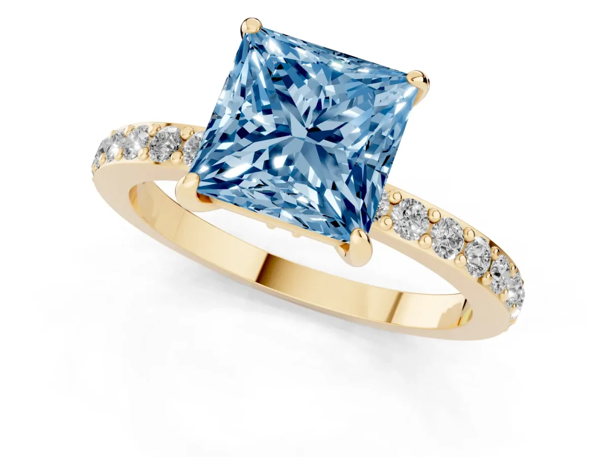 Fancy Blue Princess Cut Diamond Solitaire Engagement Ring with Pavé Band and Four-Prong Setting Yellow gold