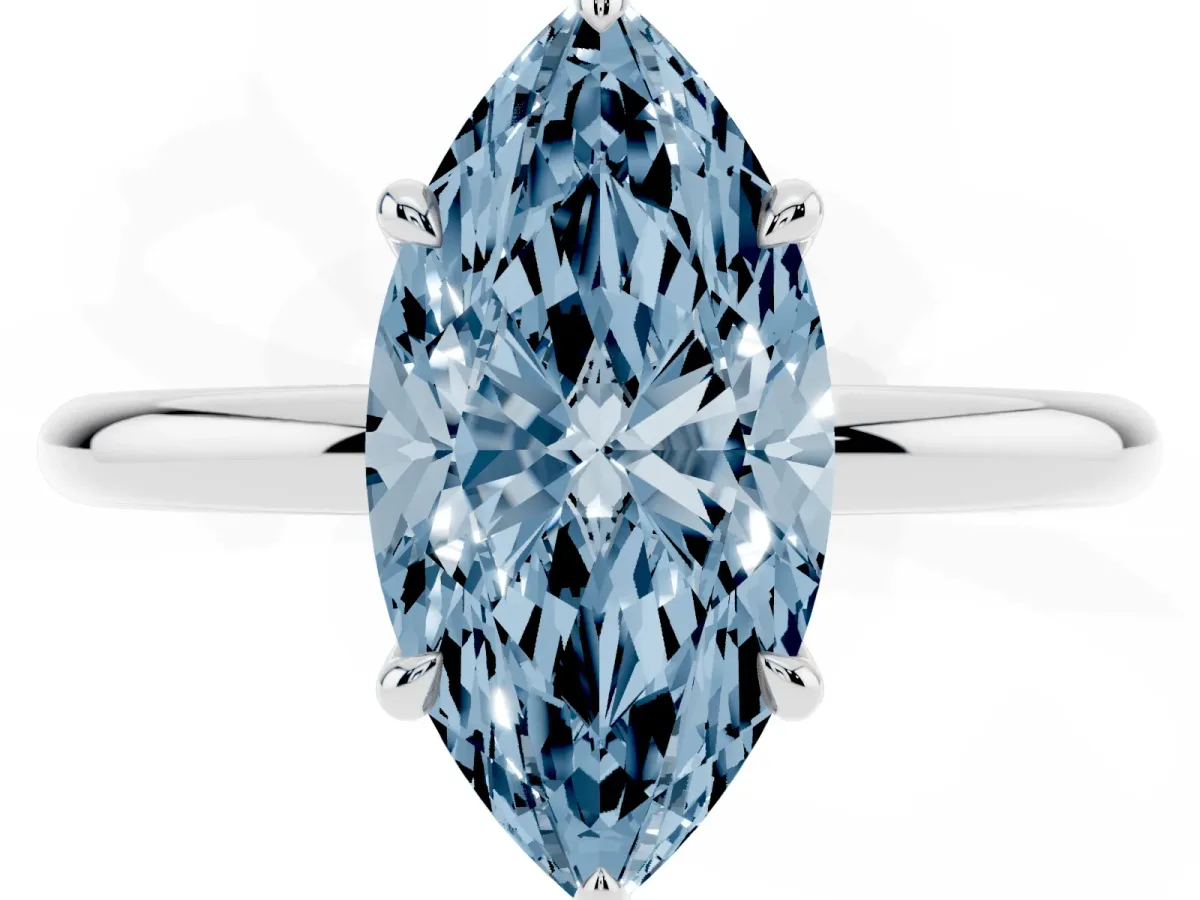 Fancy Blue Marquise Cut Diamond Solitaire Ring with Thin Band and Four-Prong Setting Silver