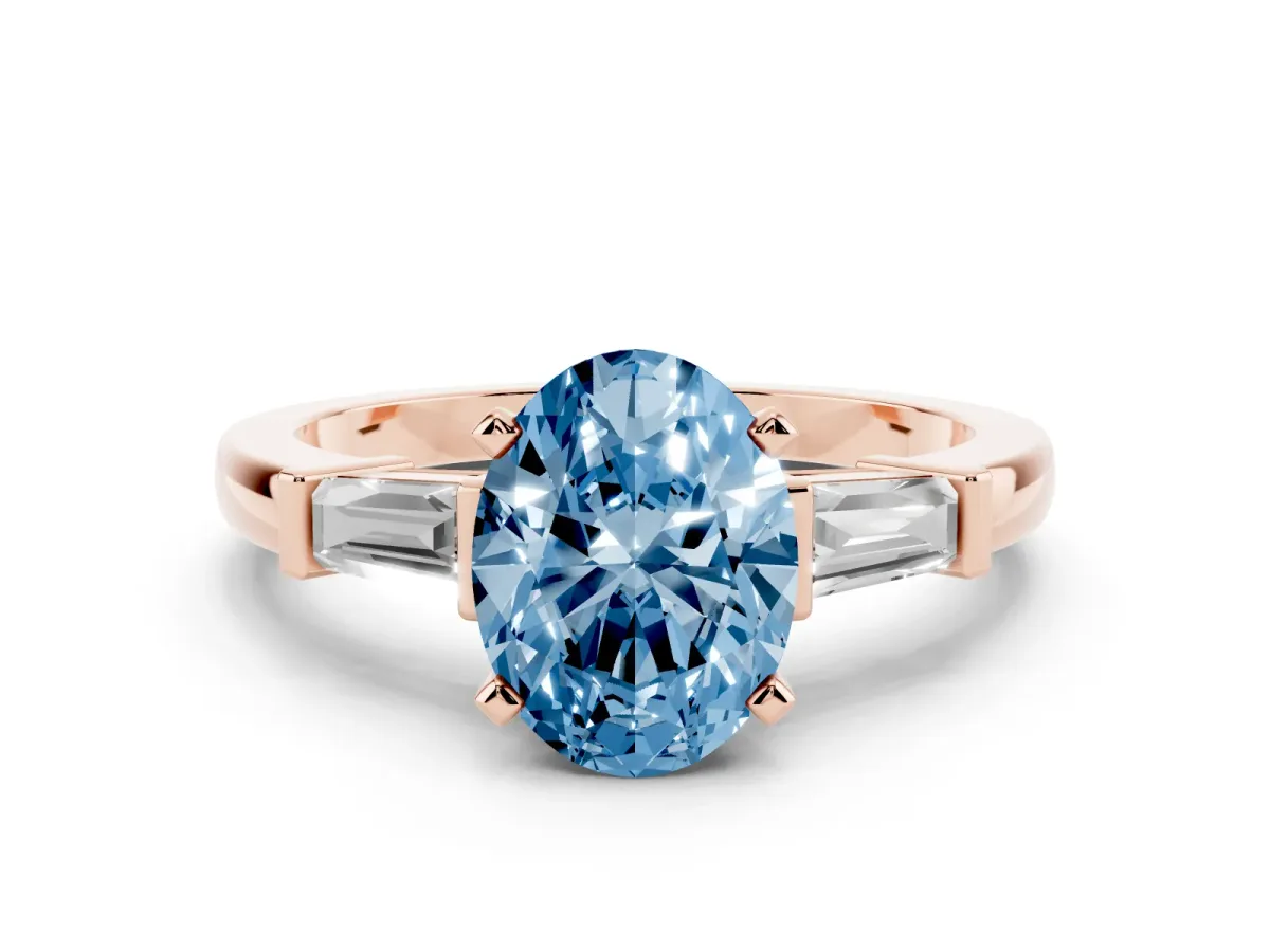 Fancy Blue Oval Cut Cut Diamond Solitaire Ring with Tapered Baguette Accents and Four-Prong Setting Rose gold