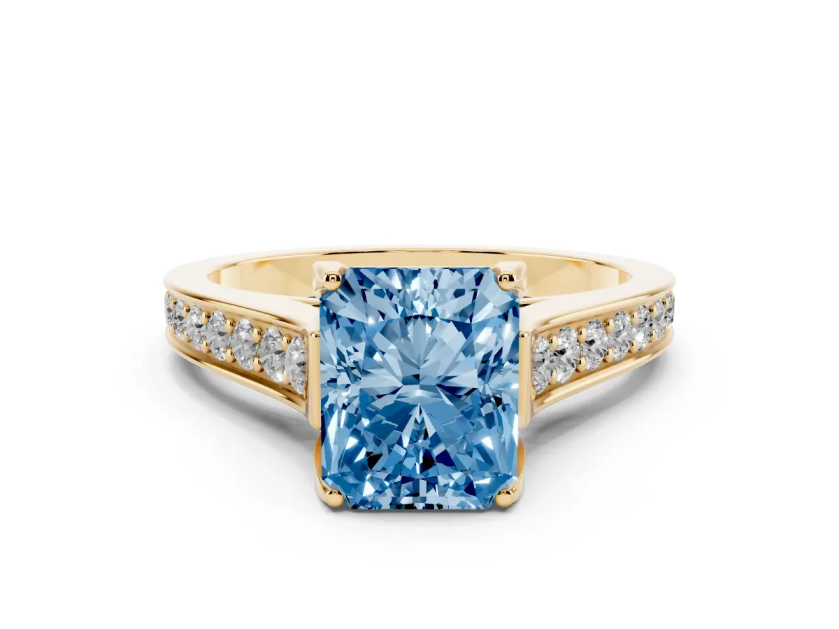 Fancy Blue Radiant Cut Brilliant Cut Diamond Engagement Ring with Pavé Band and Four-Prong Setting Yellow gold