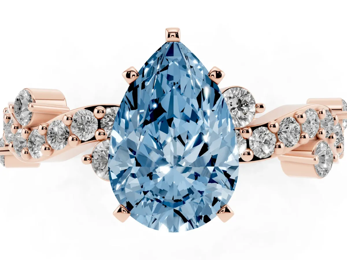 Fancy Blue Pear Cut Cut Solitaire Diamond Twisted Band with Pave Setting Rose gold