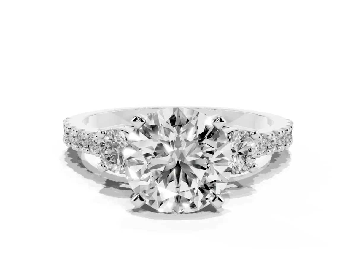Round Cut Three-Stone Diamond Pavé Band with Prong Setting White gold