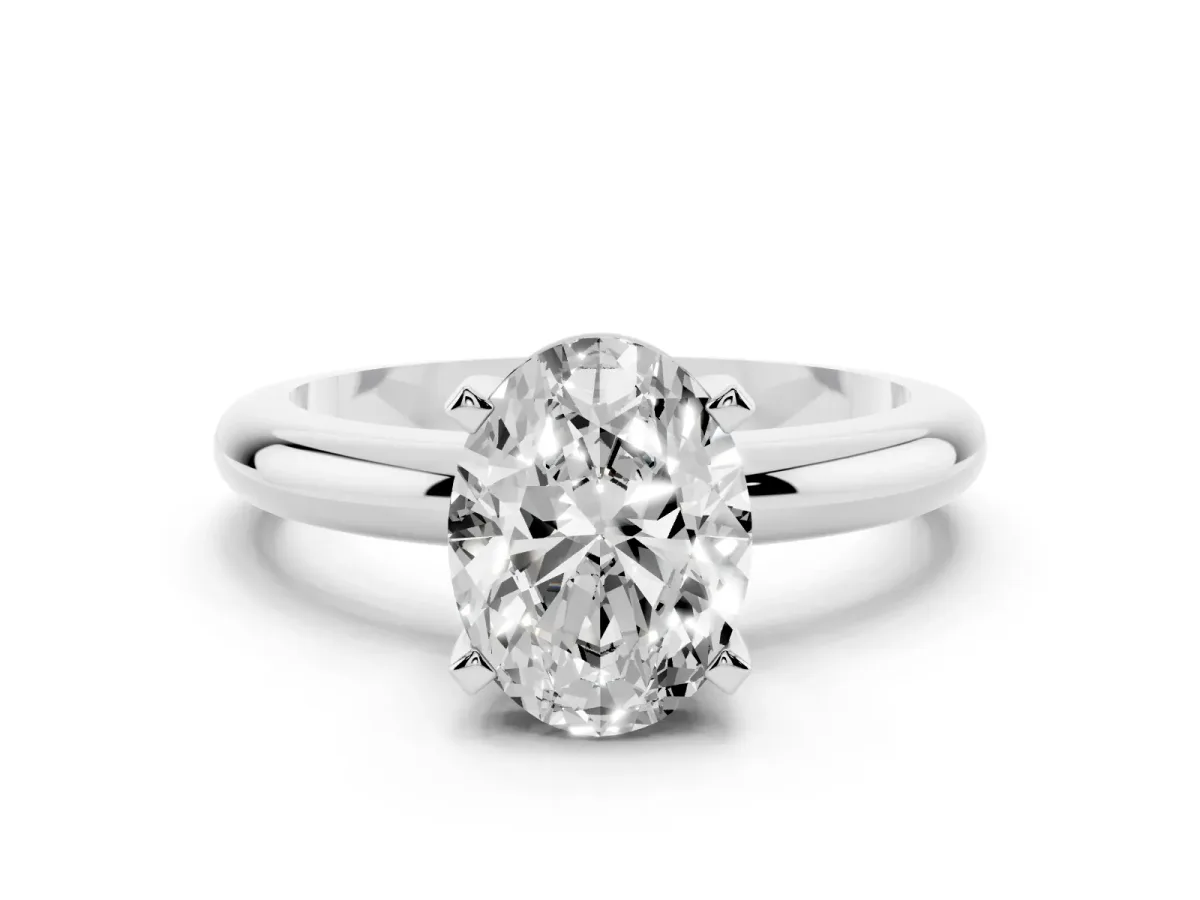 Oval Cut Diamond Solitaire Engagement Ring with Round Band and Four-Prong Setting Platinum