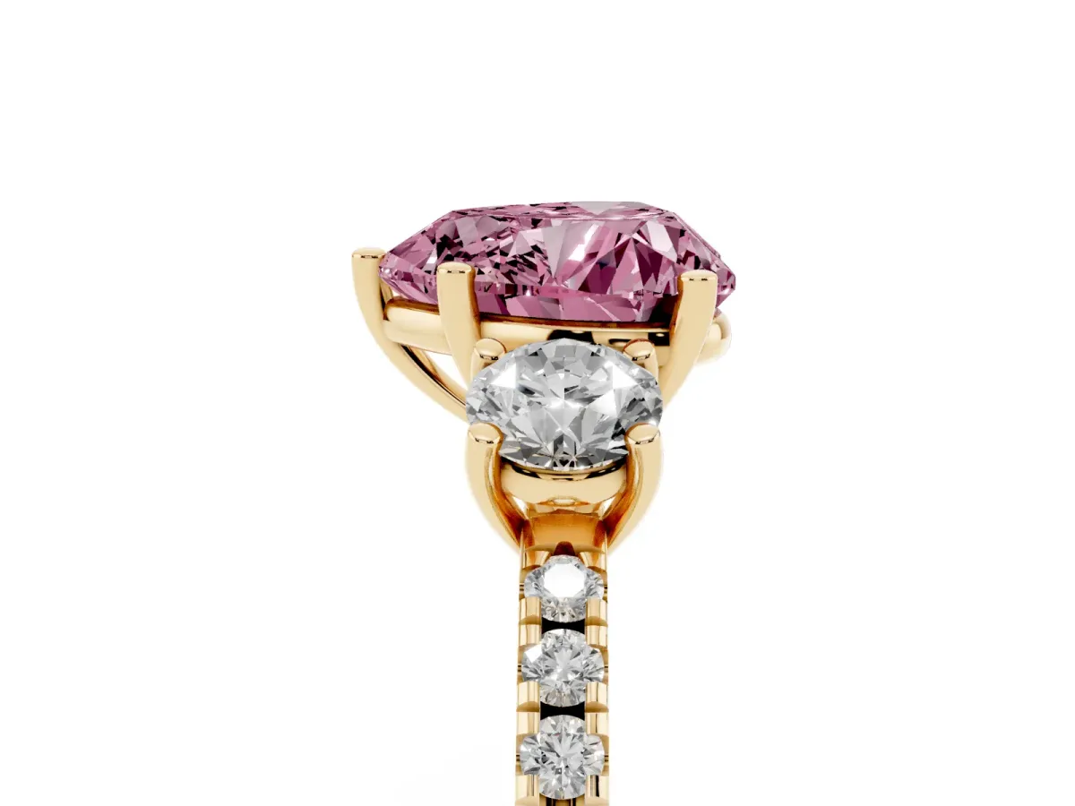 Fancy Pink Three-Stone Heart Cut Cut Diamond Pavé Band with Prong Setting Yellow gold