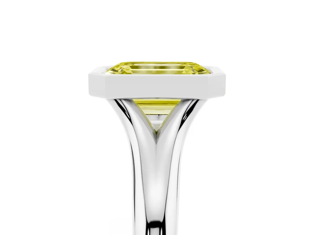 Fancy Yellow Bezel Set Emerald Cut Solitaire Diamond Ring with Smooth Band Silver