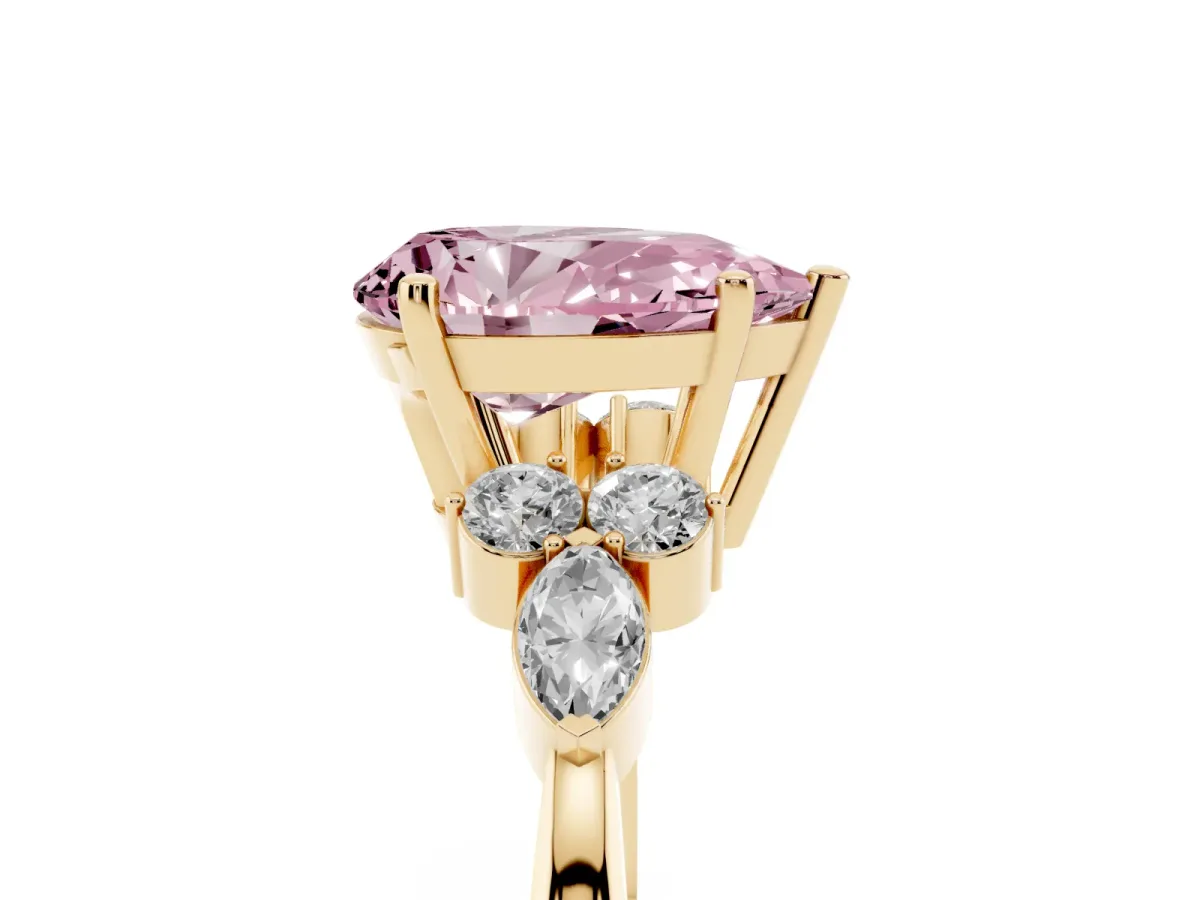 Fancy Pink Pear Cut Brilliant Diamond Solitaire Ring with Pear Side Stones and Four-Prong Setting Yellow gold