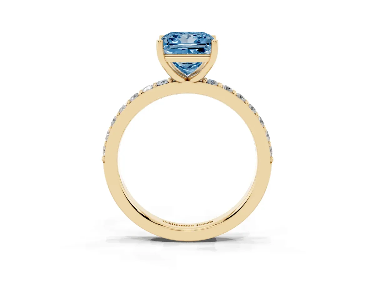 Fancy Blue Princess Cut Cut Diamond Solitaire with Pave Band and Four-Prong Setting Yellow gold