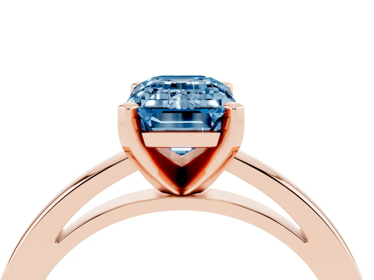 Fancy Blue Emerald Cut Solitaire Diamond Engagement Ring with Four-Prong Setting on a Classic Band Rose gold