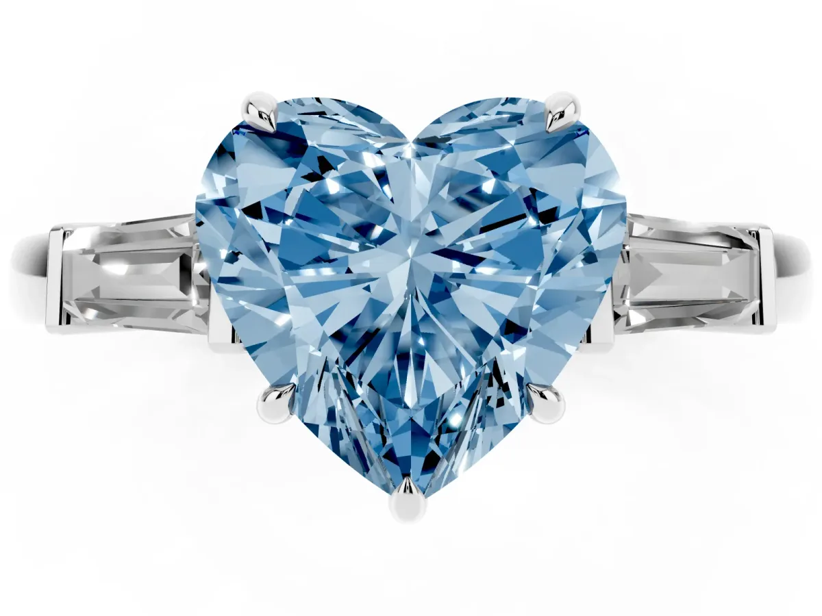 Fancy Blue Heart Cut Diamond Three-Stone Ring with Tapered Baguette Side Stones and Prong Setting Silver