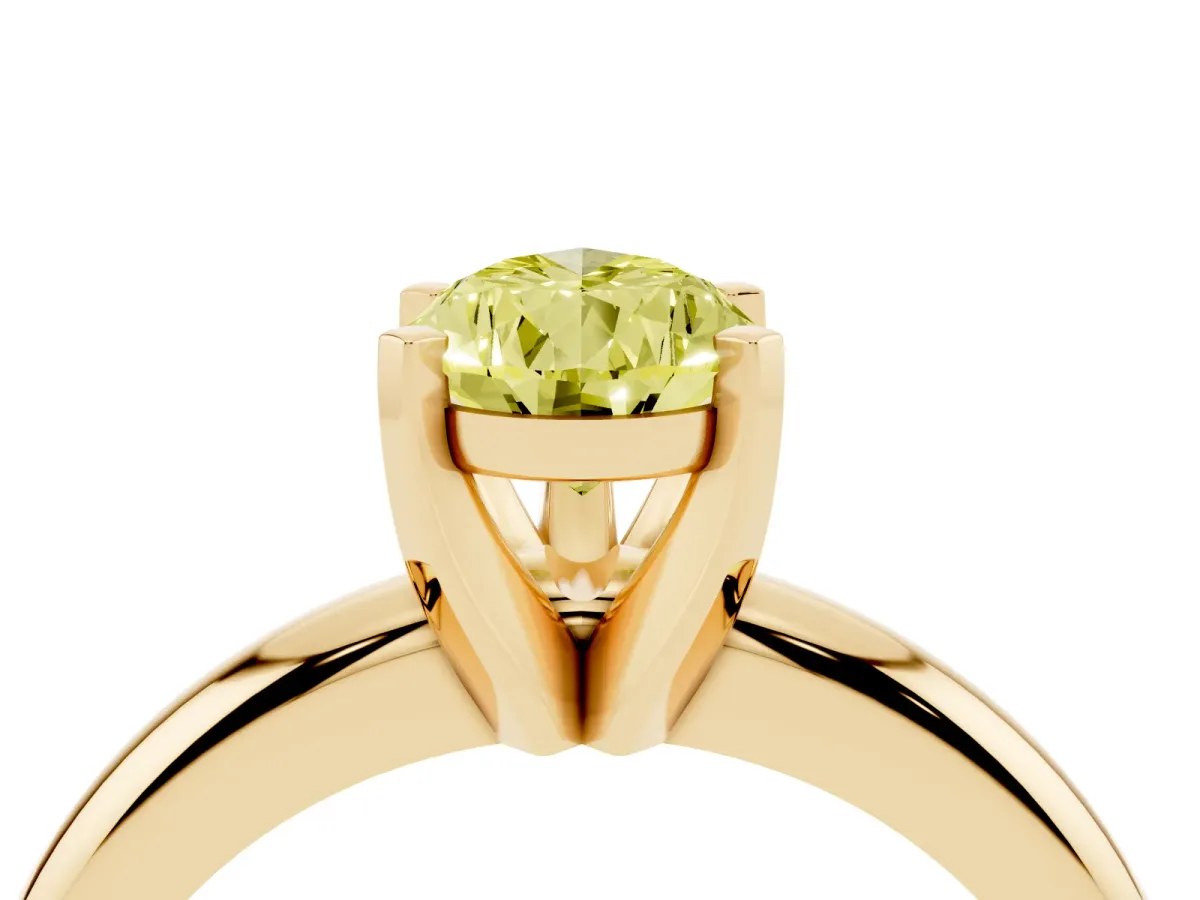 Fancy Yellow Pear Cut Diamond Solitaire Engagement Ring with Round Band and Four-Prong Setting Yellow gold