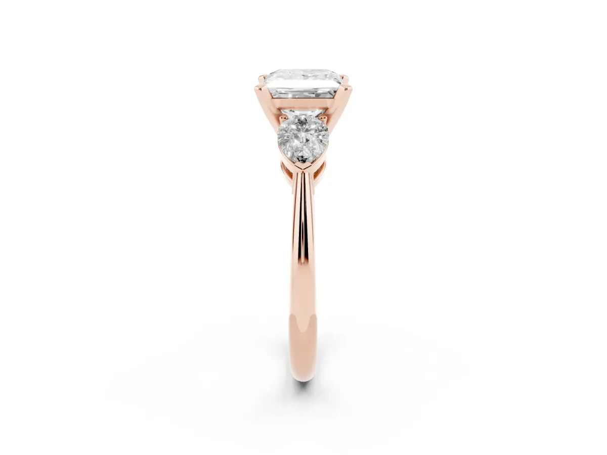Three-Stone Princess Cut Diamond Ring with Pear Side Stones and Four-Prong Setting Rose gold