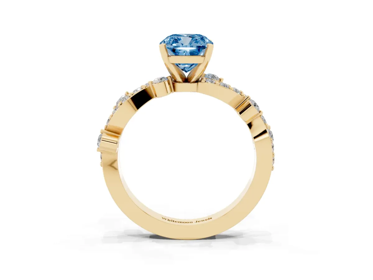 Fancy Blue Cushion Cut Cut Solitaire Diamond Twisted Band with Pave Setting Yellow gold