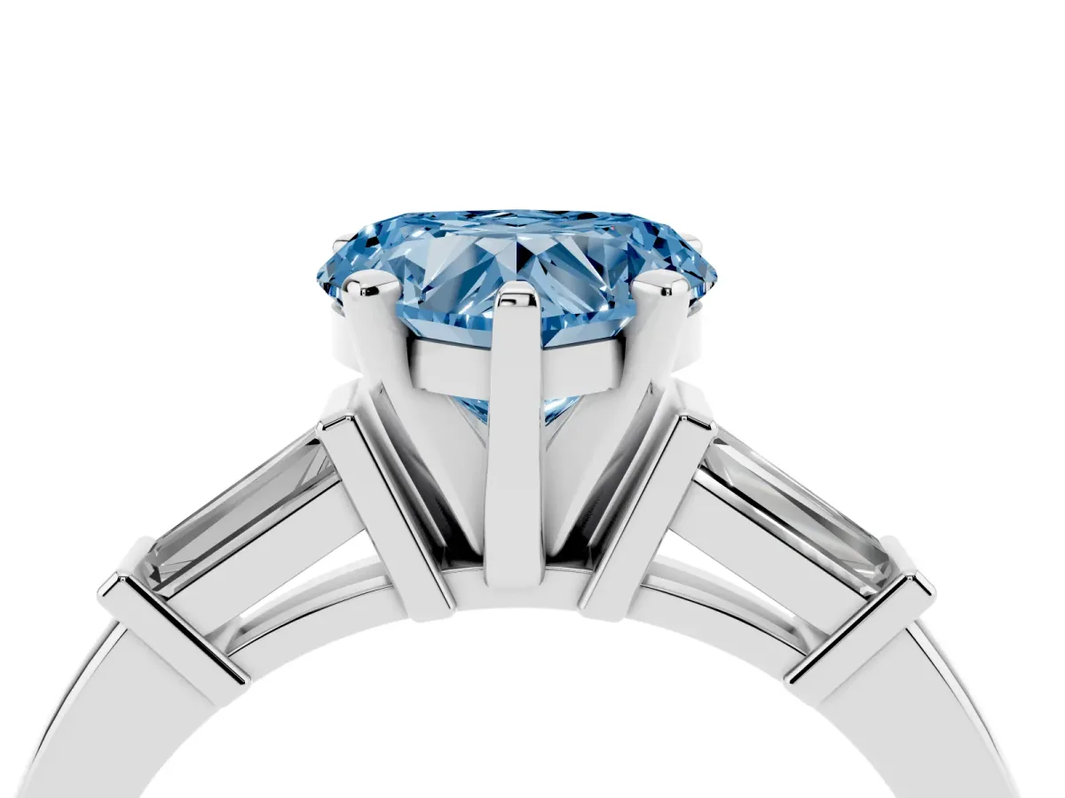 Fancy Blue Heart Cut Cut Diamond Solitaire Ring with Tapered Baguette Accents and Four-Prong Setting Silver