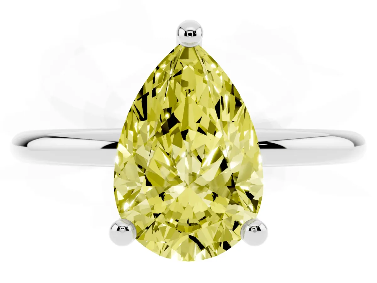 Fancy Yellow Pear Cut Solitaire Diamond Ring with 4-Prong Setting on a Classic Band Silver