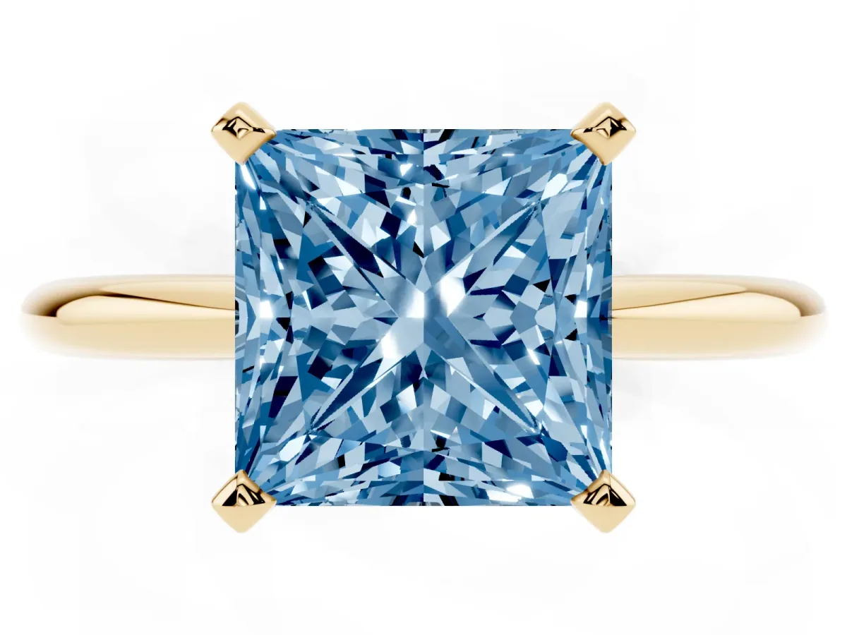 Fancy Blue Princess Cut Diamond Solitaire Ring with Prong Setting and Classic Band Yellow gold