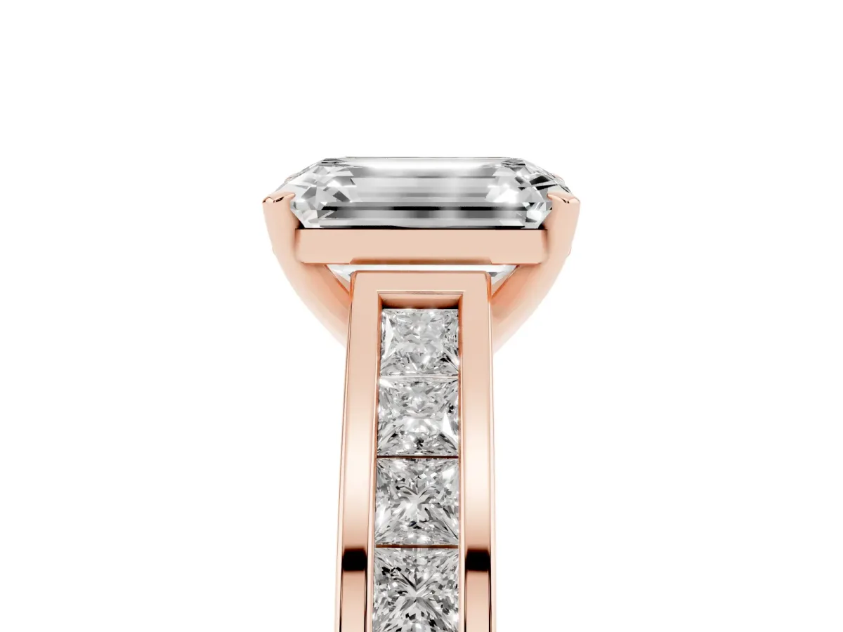 Emerald Cut Solitaire Diamond Ring with Channel-Set Band and Four-Prong Setting Rose gold