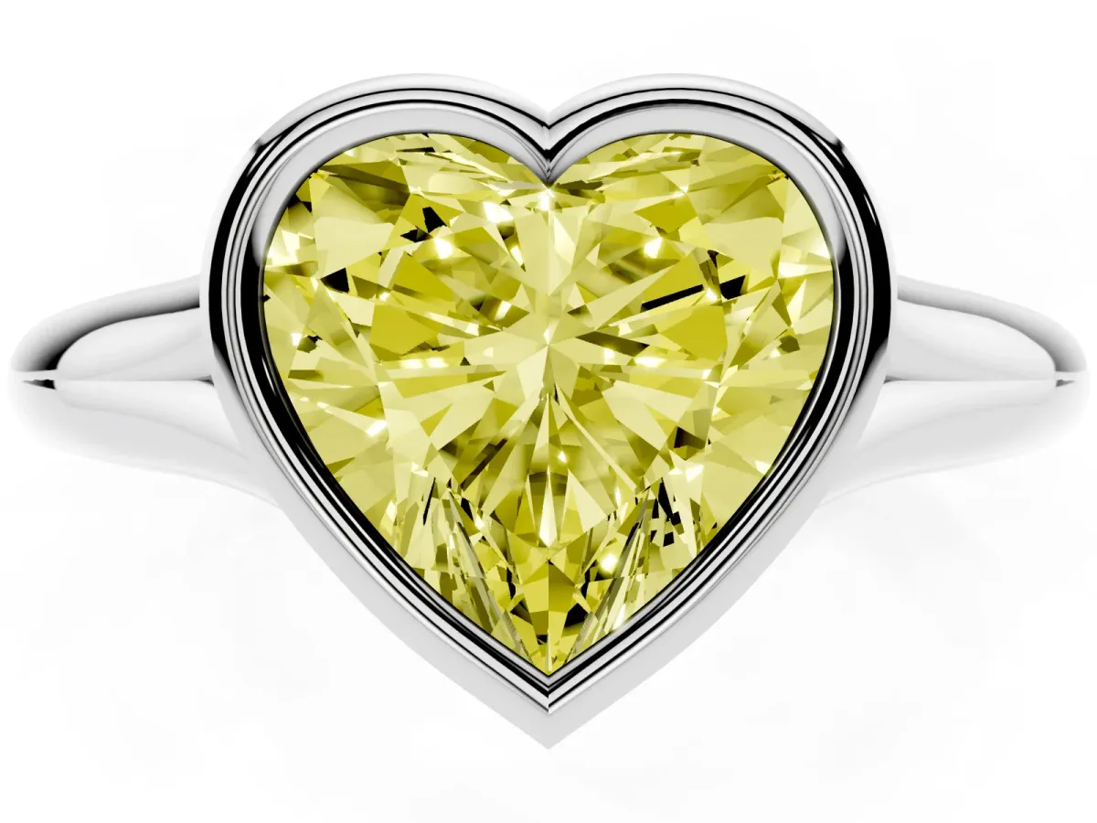 Fancy Yellow Bezel Set Heart Cut Solitaire Diamond Ring with Smooth Band Silver