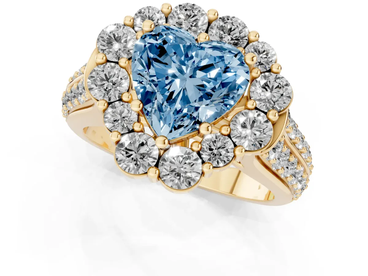 Fancy Blue Heart Cut Halo Diamond Engagement Ring with Split Shank and Prong Setting Yellow gold