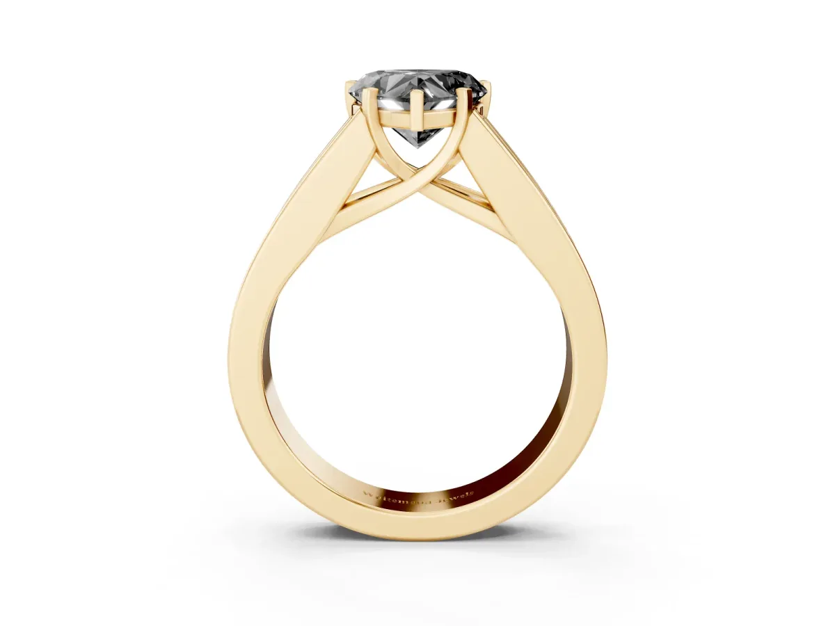 Fancy Black Heart Cut Cut Channel Set Solitaire Ring with Four-Prong Setting Yellow gold
