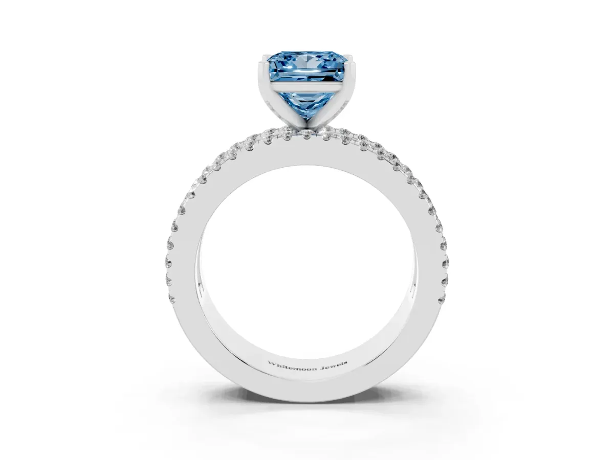 Fancy Blue Princess Cut Diamond Solitaire Ring with Pavé and Channel Set Band Silver