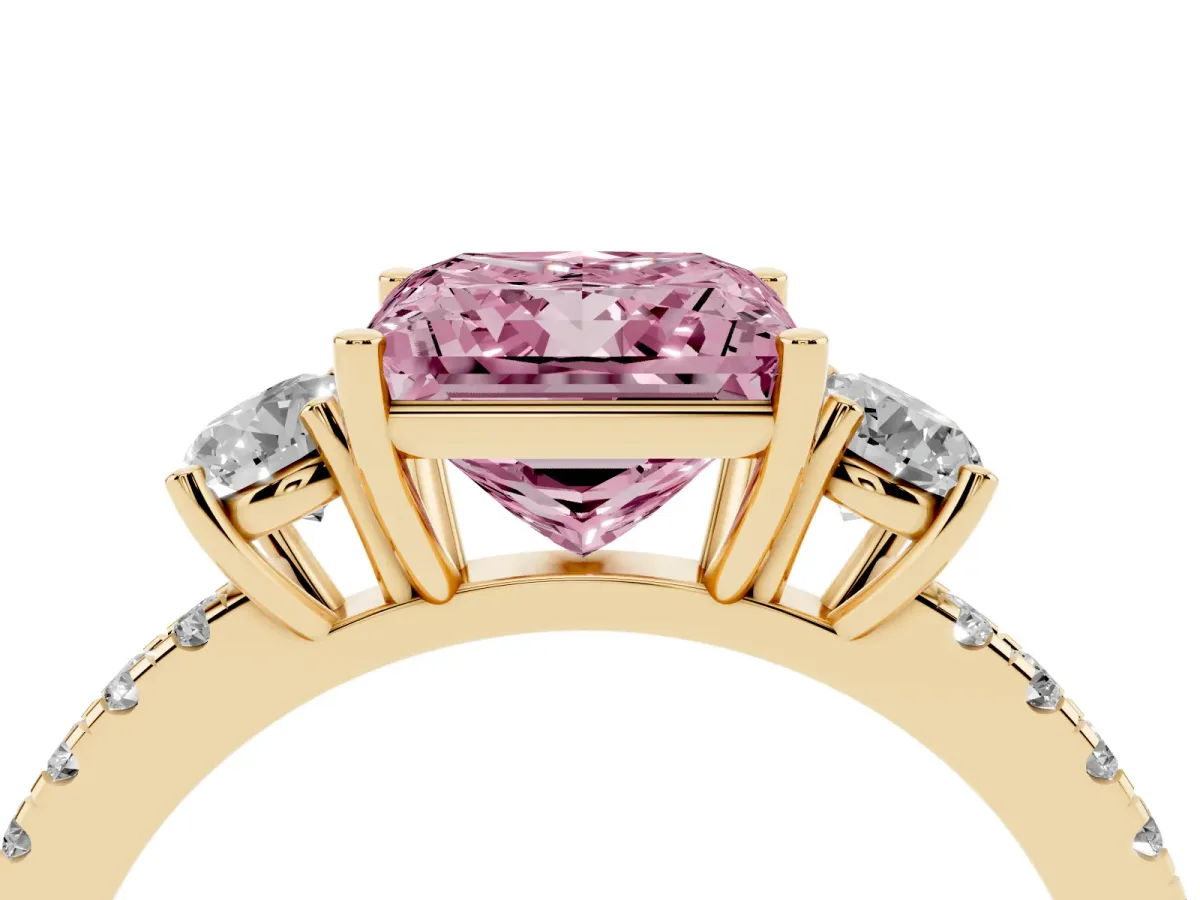 Fancy Pink Three-Stone Princess Cut Cut Diamond Pavé Band with Prong Setting Yellow gold