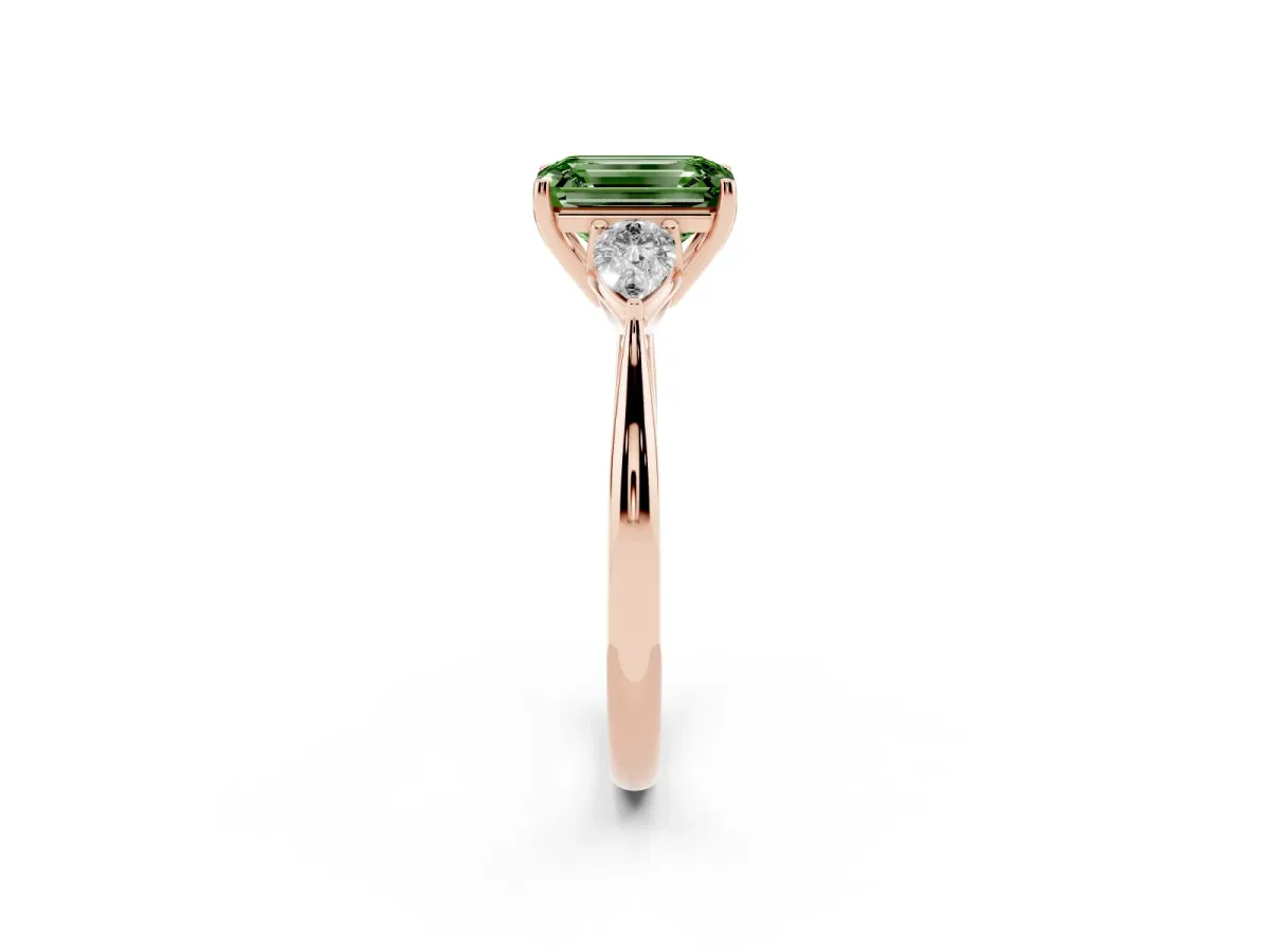 Fancy Green Three-Stone Emerald Cut Diamond Ring with Pear Side Stones in Four-Prong Setting Rose gold