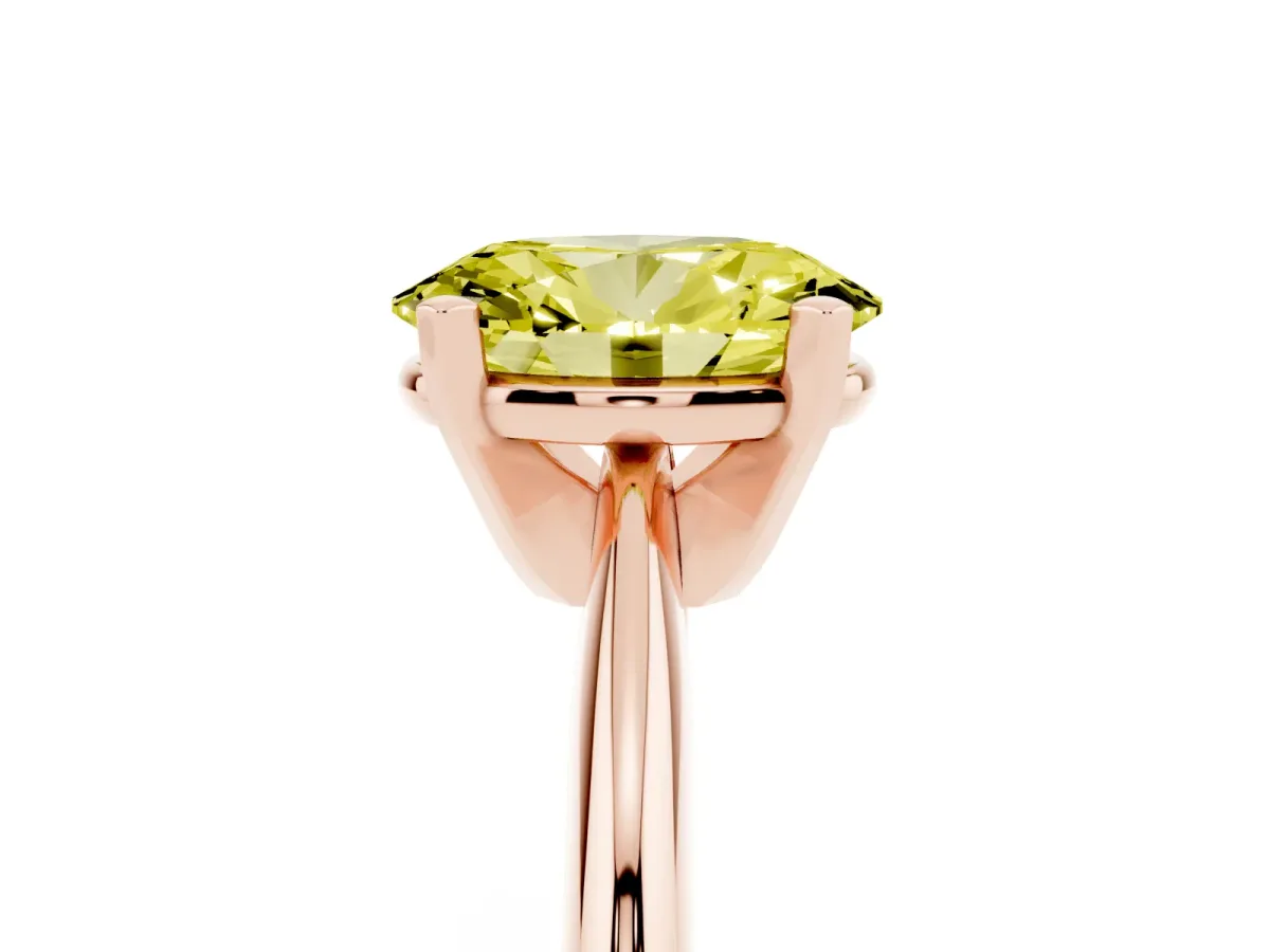 Fancy Yellow Oval Cut Cut Solitaire Ring with Four-Prong Setting on a Classic Band Rose gold
