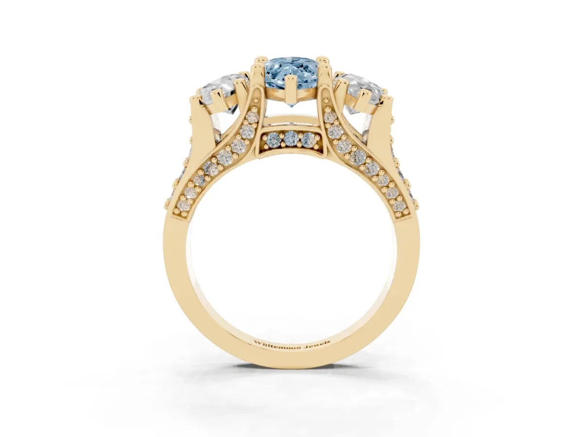 Fancy Blue Marquise Cut Diamond Three-Stone Ring with Channel Set Band and Four-Prong Setting Yellow gold
