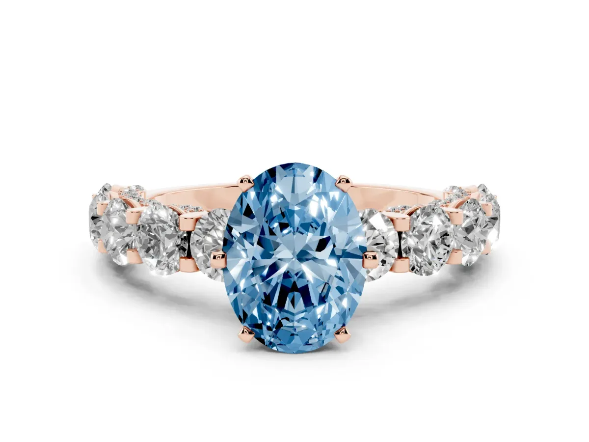 Fancy Blue Oval Cut Diamond Side Stone Engagement Ring with Four-Prong Setting Rose gold