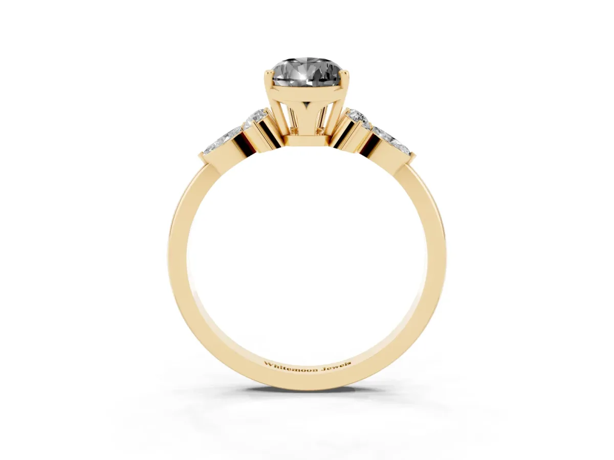 Fancy Black Pear Cut Brilliant Diamond Solitaire Ring with Pear Side Stones and Four-Prong Setting Yellow gold