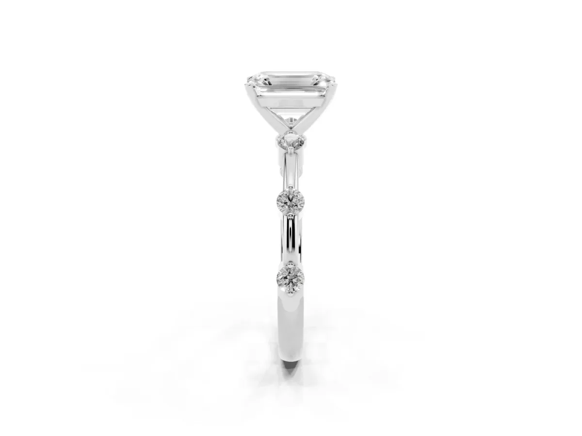 Emerald Cut Solitaire Diamond Ring with Bezel Set Side Stones and Prong Setting Platinum