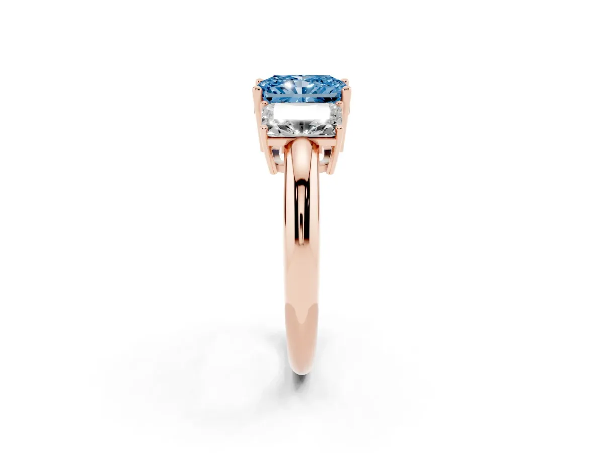 Fancy Blue Three-Stone Radiant Cut Cut Diamond Engagement Ring with Prong Setting on a White Gold Band Rose gold