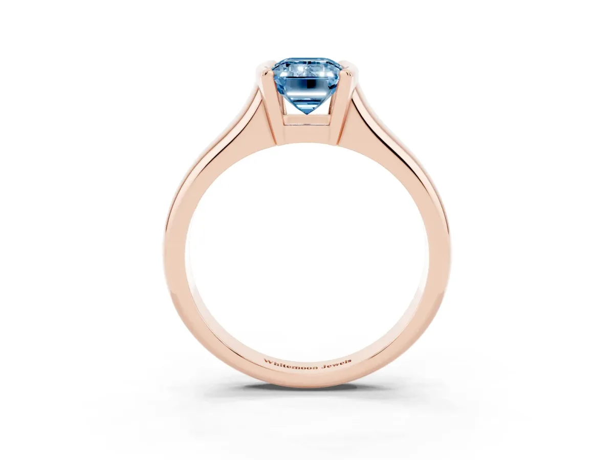 Fancy Blue Emerald Cut Solitaire Tension Set Diamond Ring with Split Shank Band Rose gold