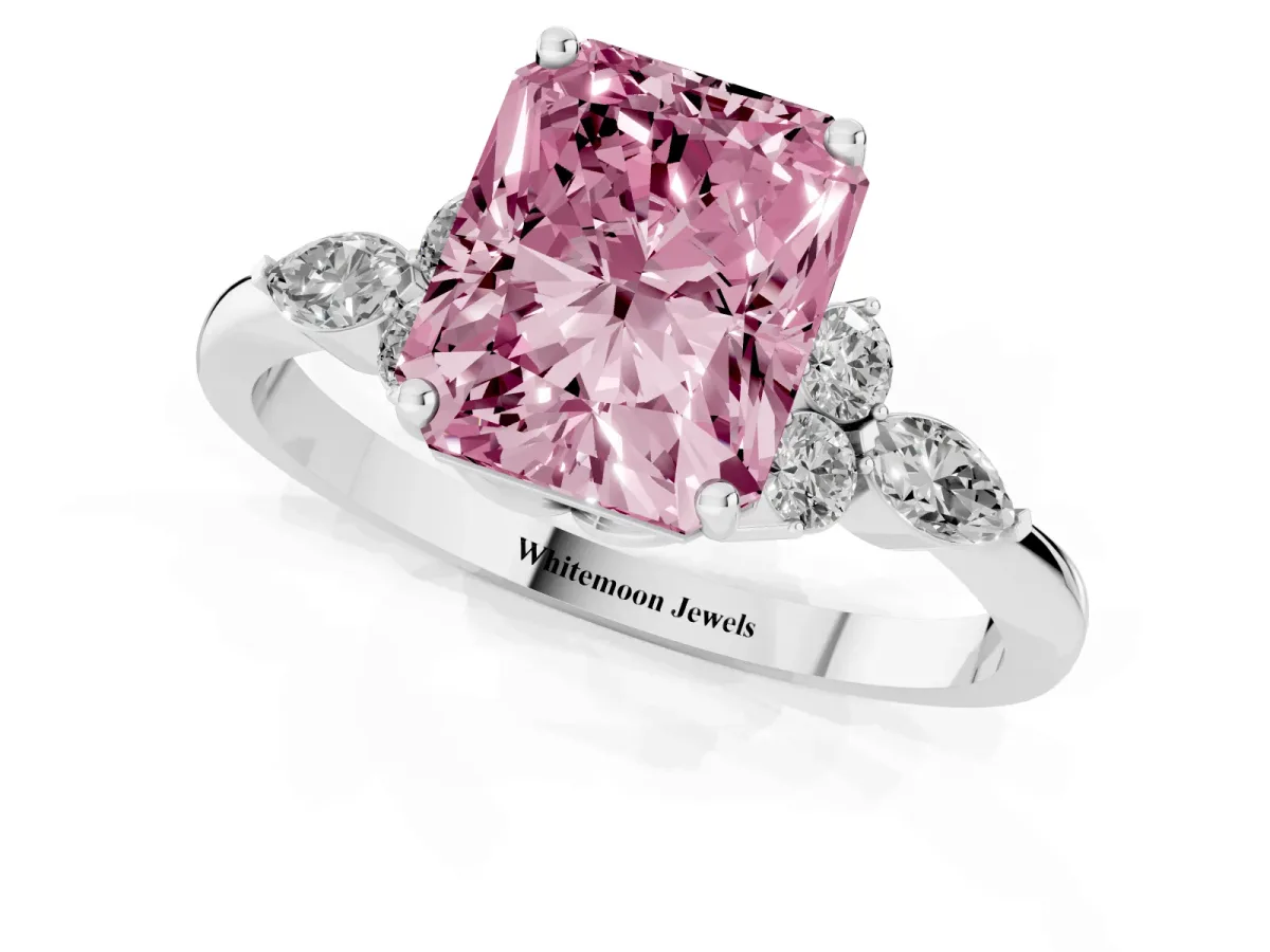 Fancy Pink Radiant Cut Brilliant Diamond Solitaire Ring with Pear Side Stones and Four-Prong Setting Platinum