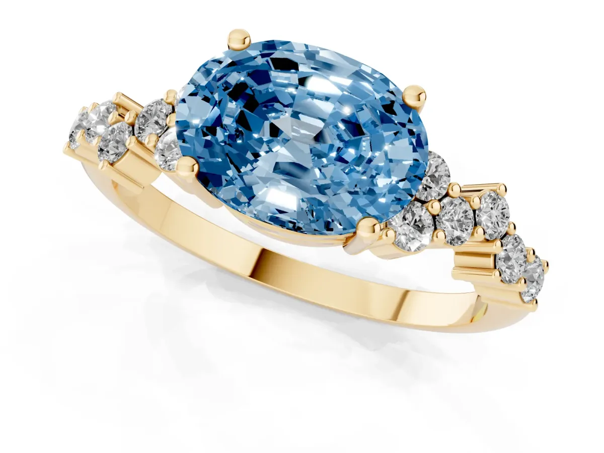 Fancy Blue Oval Cut Diamond Scattered Round Accent Ring with Prong Setting Yellow gold