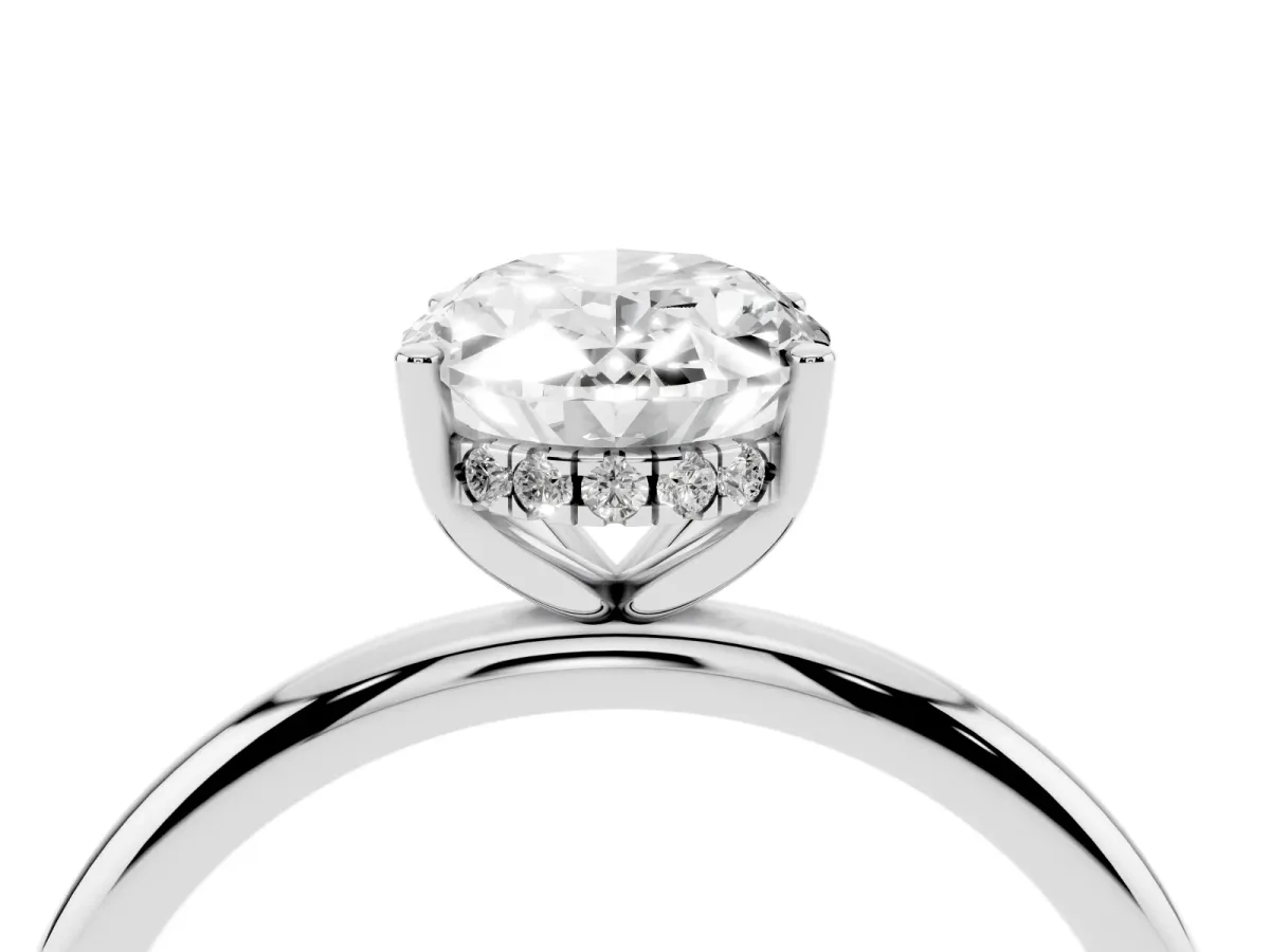 Oval Cut Cut Solitaire Engagement Ring with Four-Prong Setting and Classic Band Silver