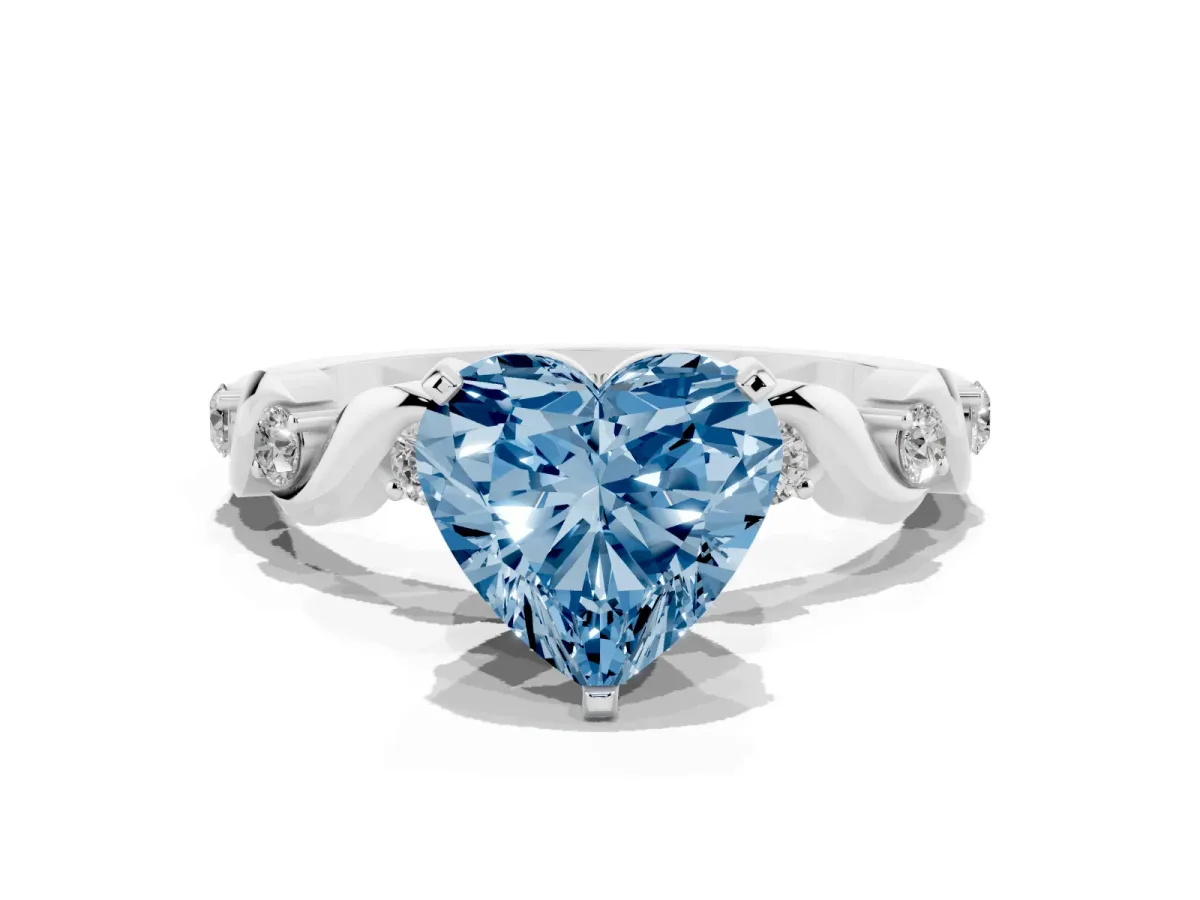 Fancy Blue Heart Cut Diamond Solitaire Twisted Band with Round Accents and Prong Setting Platinum