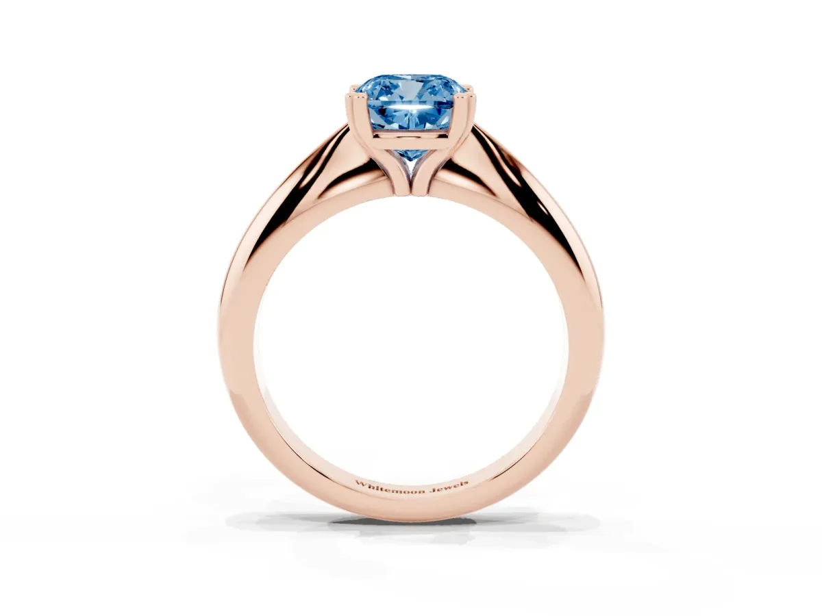 Fancy Blue Cushion Cut Cut Solitaire Engagement Ring with Tapered Band and Four-Prong Setting Rose gold