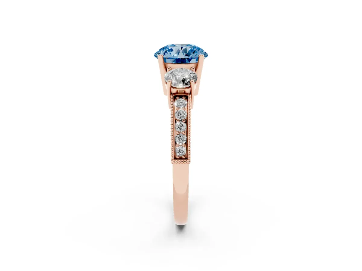 Fancy Blue Round Cut Three-Stone Diamond Ring with Pavé Band and Four-Prong Setting Rose gold