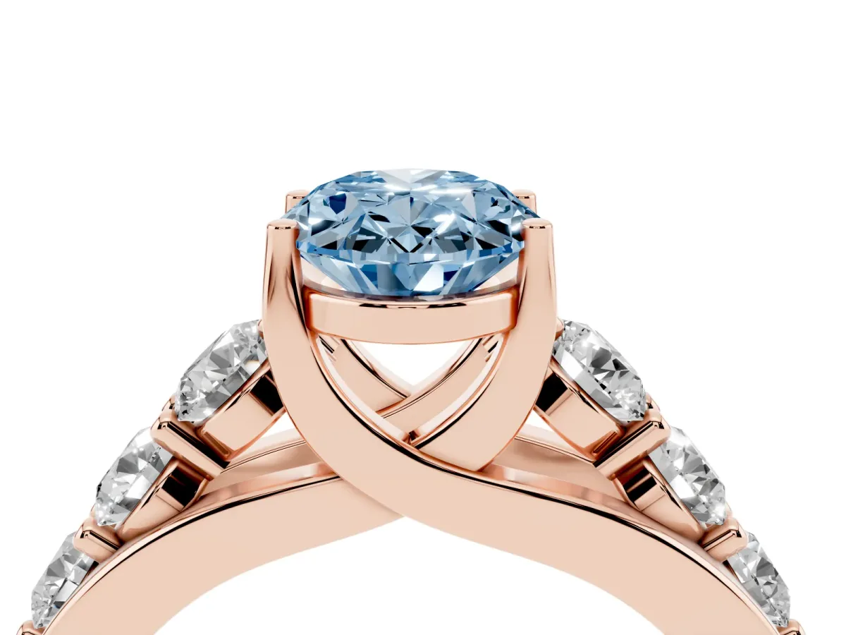 Fancy Blue Oval Cut Diamond Engagement Ring with Pavé Band and Four-Prong Setting Rose gold