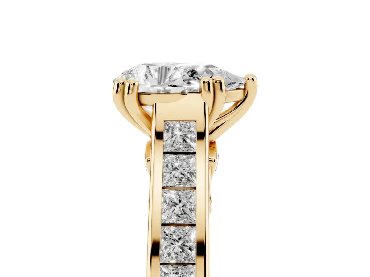 Pear Cut Cut Channel Set Solitaire Engagement Ring with Prong Setting Yellow gold