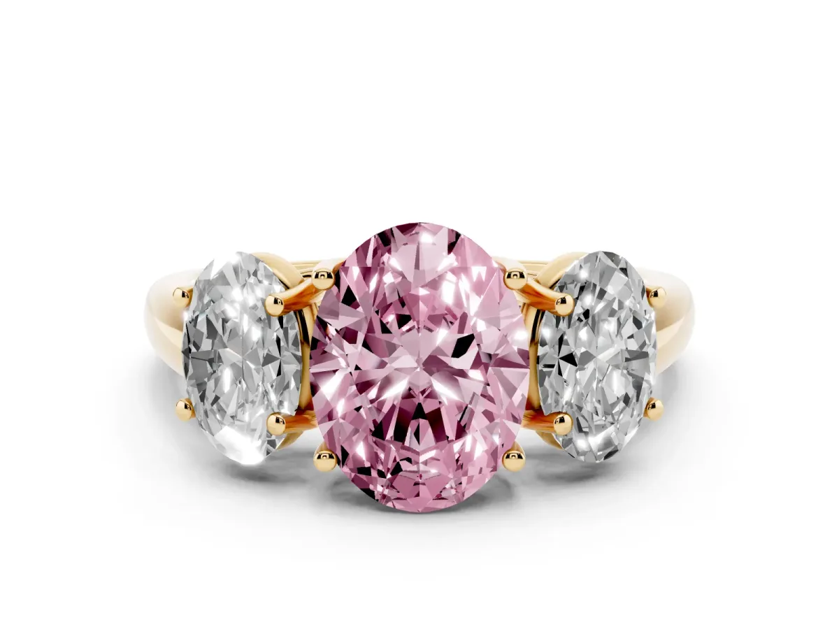 Fancy Pink Three-Stone Oval Cut Diamond Engagement Ring with Prong Setting Yellow gold