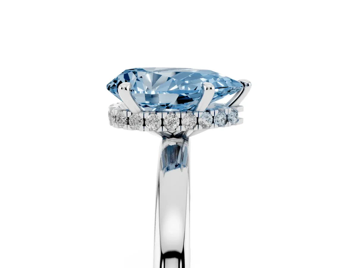 Fancy Blue Pear Cut Solitaire Engagement Ring with Cathedral Band and Four-Prong Setting White gold