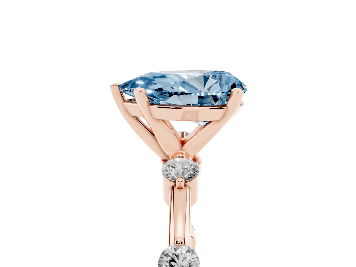 Fancy Blue Pear Cut Solitaire Diamond Ring with Bezel Set Side Stones and Prong Setting Rose gold