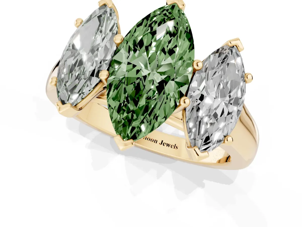 Fancy Green Marquise Cut Three-Stone Diamond Ring with Prong Setting on a Classic Band Yellow gold