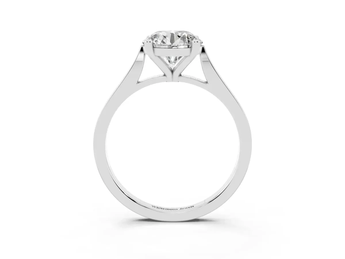 Round Cut Solitaire Diamond Ring with Four-Prong Setting and Tapered Band Platinum
