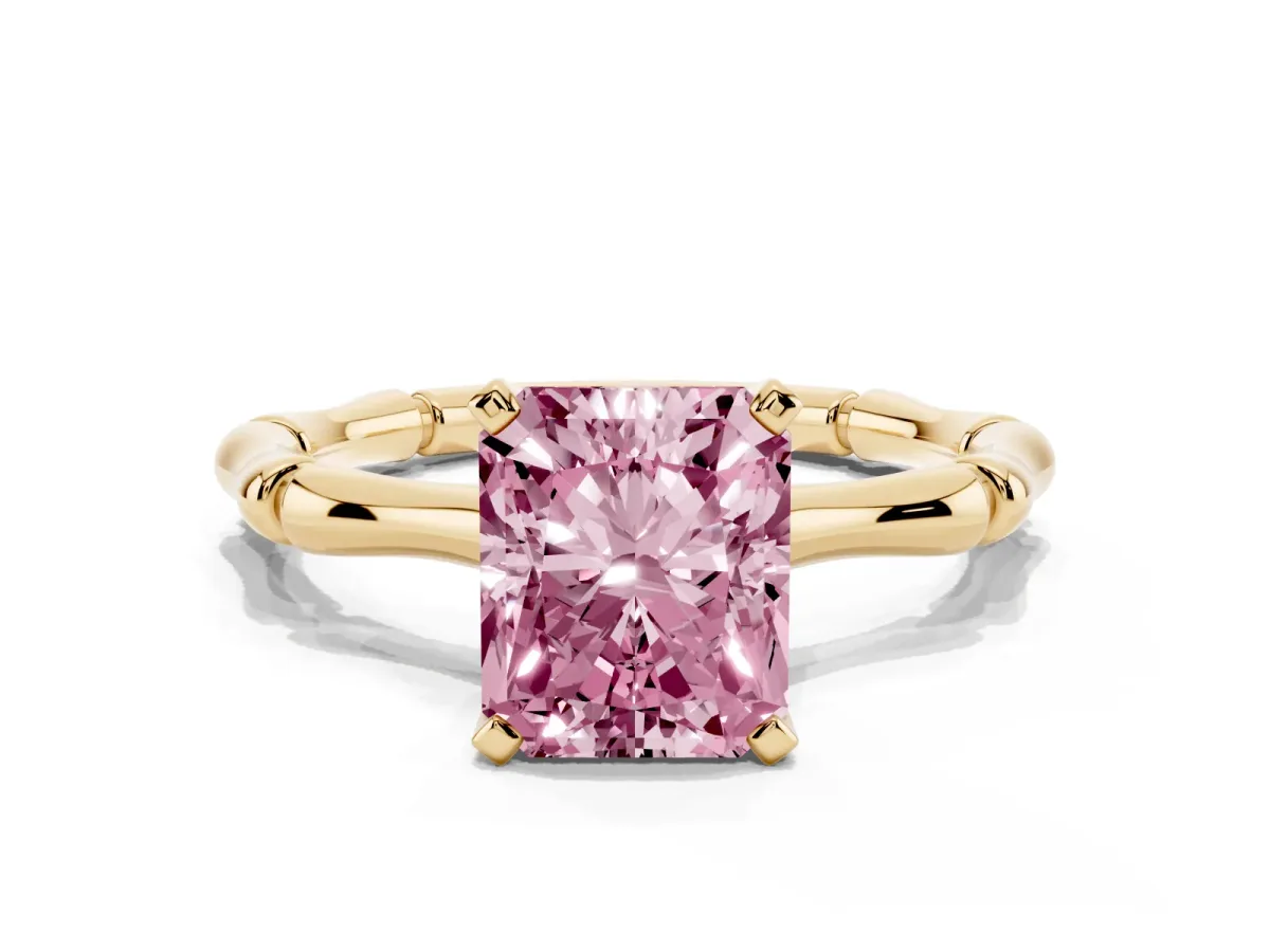 Fancy Pink Radiant Cut Solitaire Diamond Ring with Bamboo Band and Four-Prong Setting Yellow gold
