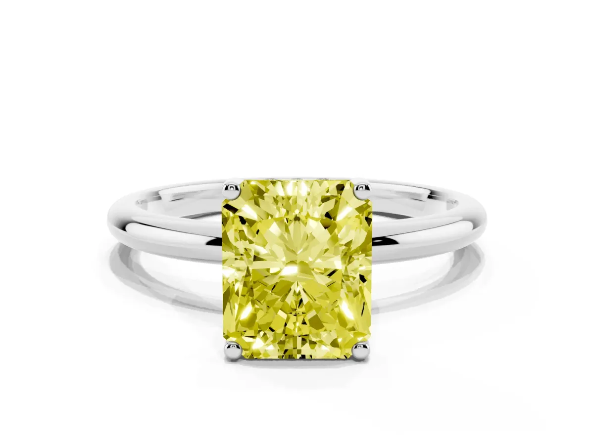 Fancy Yellow Radiant Cut Cut Solitaire Engagement Ring with Four-Prong Setting and Classic Band Silver