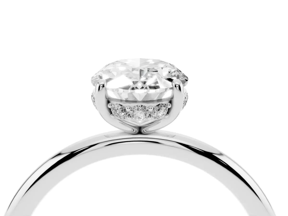 Oval Cut Solitaire Diamond Ring with a Classic Band and Four-Prong Setting Platinum